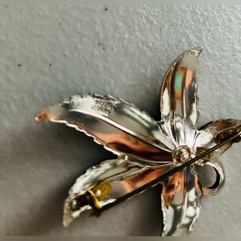 Vintage German intricate brooch maple leaf-shaped with small red crystals